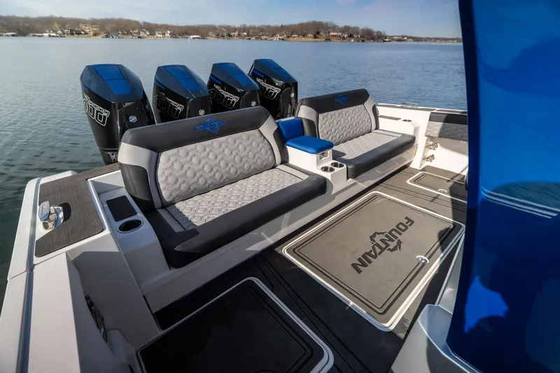 Slide: The Image of 2025 Fountain 43 SCX boat interior with seating and four powerful outboard engines. - 15