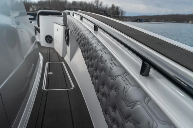 Slide: The Image of 2025 Fountain 43 SCX boat interior with sleek design and textured upholstery. - 40