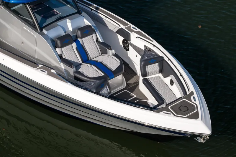 Slide: The Image of 2025 Fountain 43 SCX boat with sleek design and luxurious seating on water. - 9
