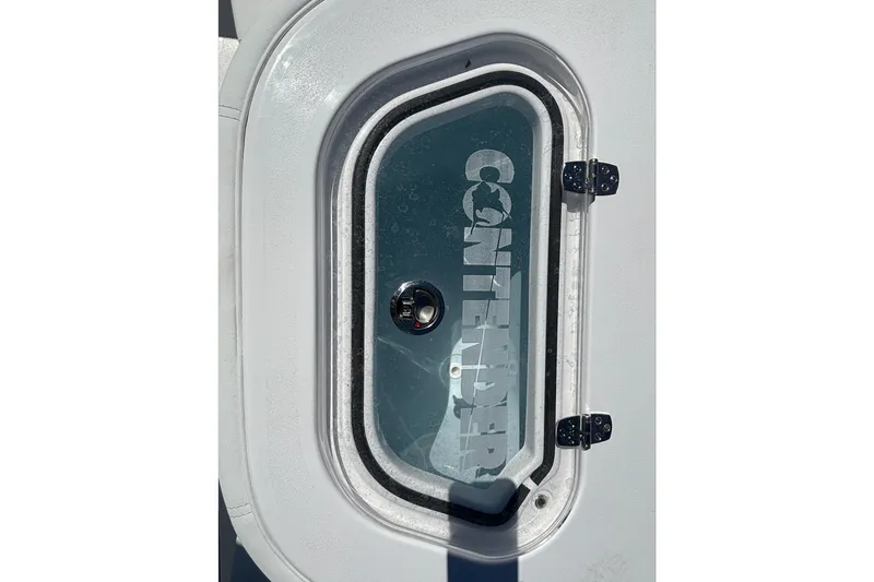 Slide: The Image of Hatch of 2026 Contender 24 Sport boat with logo visible. - 3