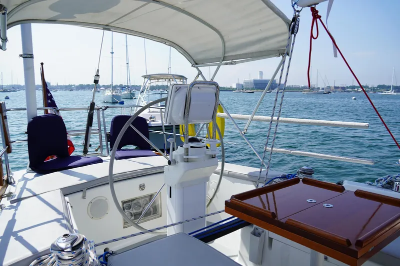Slide: The Image of Cockpit of a 1997 J Boats J/42 yacht on calm waters. - 17