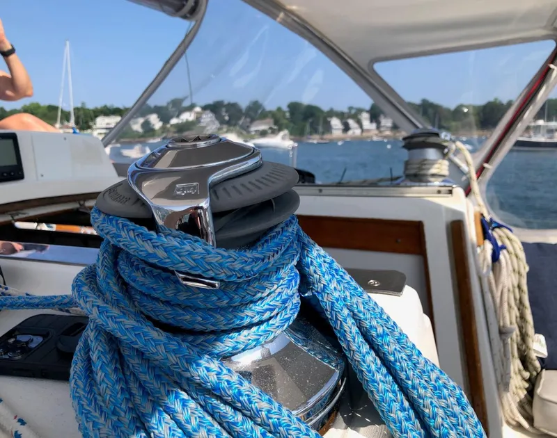 Slide: The Image of Close-up of a 1997 J Boats J/42 yacht with blue ropes. - 31