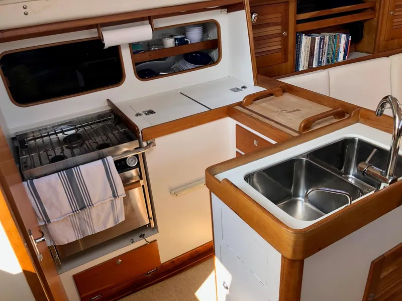 Slide: The Image of Interior of 1997 J Boats J/42 yacht featuring kitchen and sink. - 40