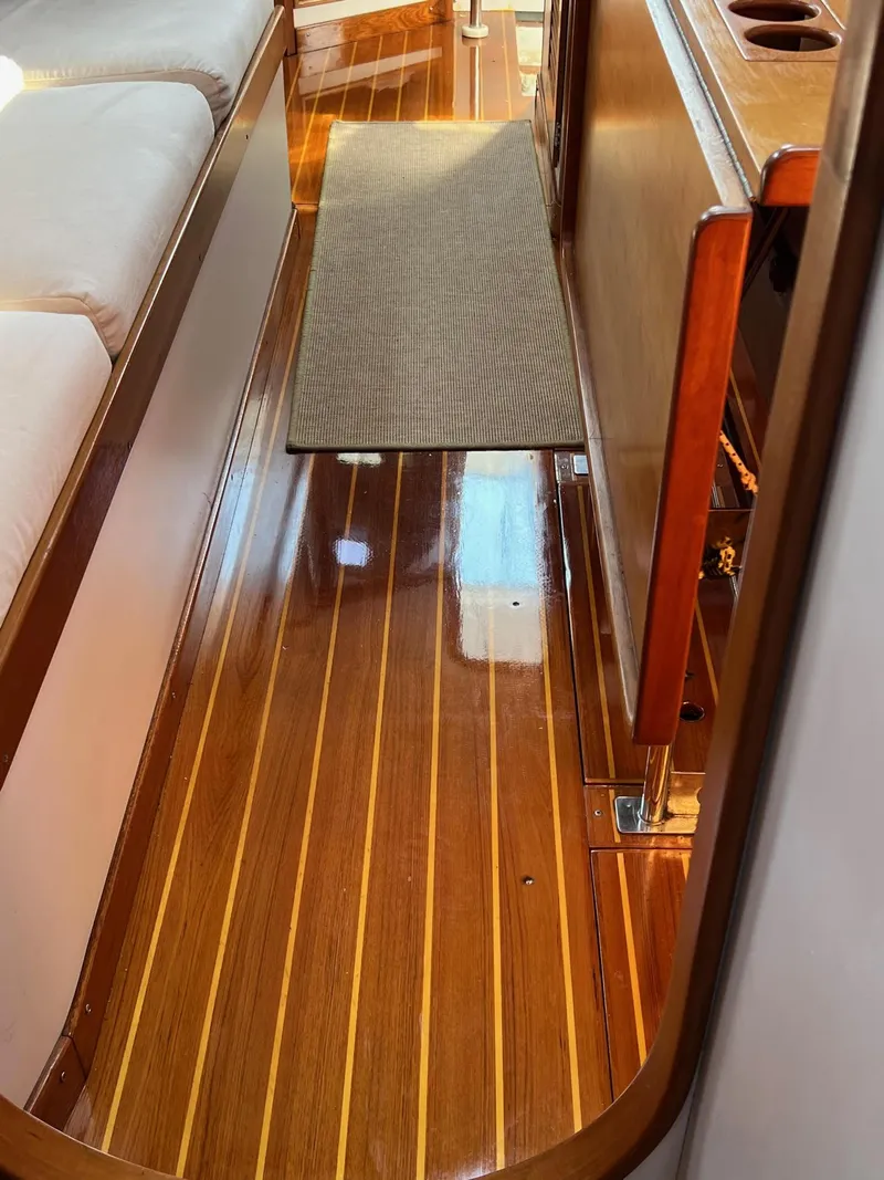 Slide: The Image of Cozy cabin interior of 1997 J Boats J/42 with wood accents and comfortable seating. - 55