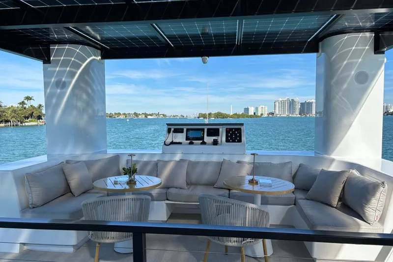 Slide: The Image of Luxurious ARKHAUS Villa 50 yacht interior with plush seating, ocean view, and modern design, 2025 model. - 16