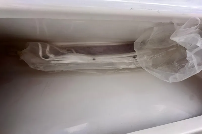 Slide: The Image of Interior view of a 2021 Sportsman Open 282 Center Console boat compartment. - 42