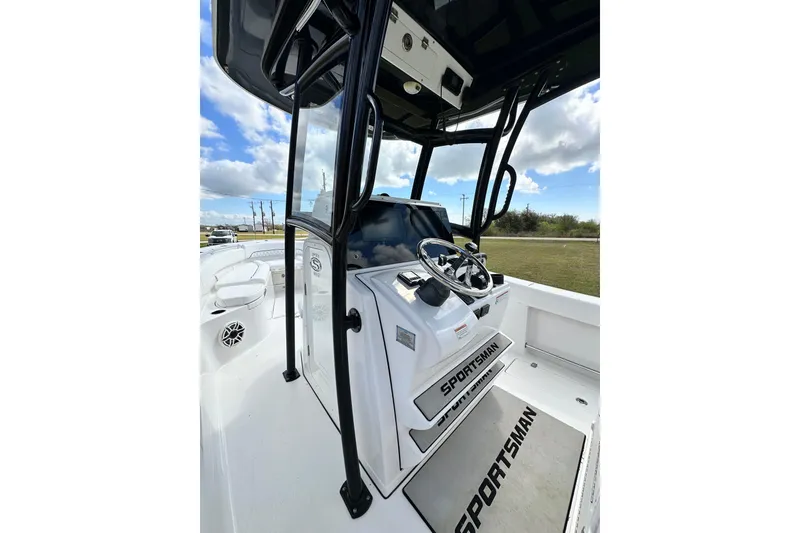 Slide: The Image of 2021 Sportsman Open 282 Center Console boat with sleek design and modern controls. - 54