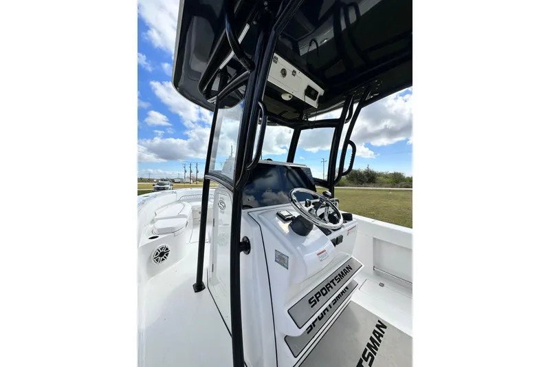 Slide: The Image of 2021 Sportsman Open 282 Center Console boat with sleek design and modern controls. - 55