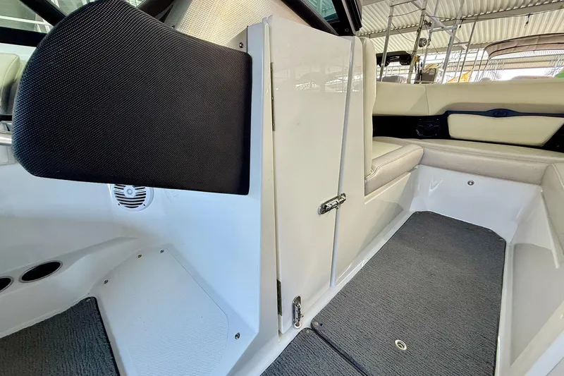 Slide: The Image of 2016 Cobalt CS3 boat interior with seating and storage compartment. - 26