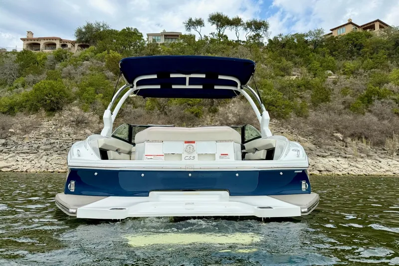 Slide: The Image of 2016 Cobalt CS3 boat on water with scenic hillside background. - 4