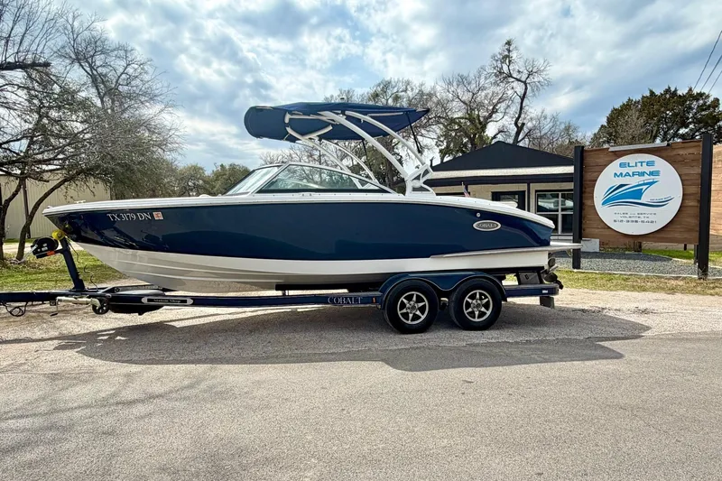 Slide: The Image of 2016 Cobalt CS3 boat on trailer at Elite Marine dealership. - 9