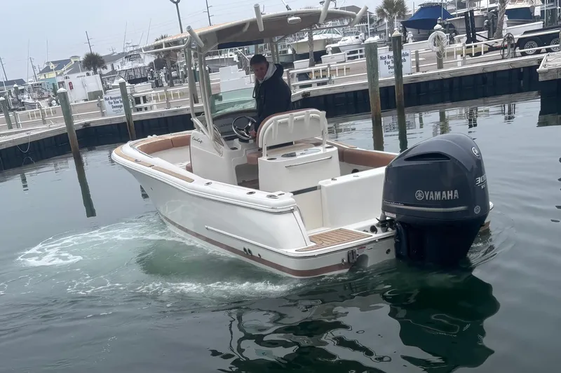 Slide: The Image of 2013 Chris-Craft Catalina 23 boat with Yamaha engine in marina setting. - 10