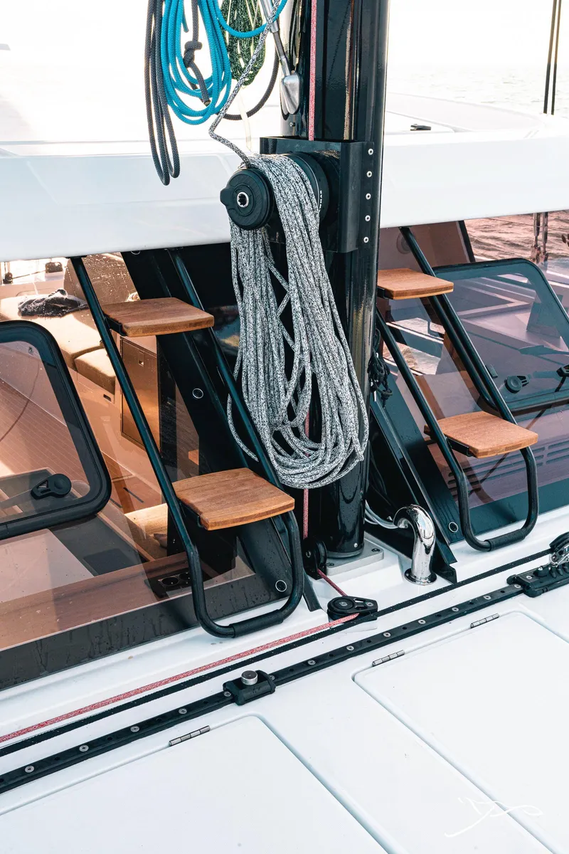 Slide: The Image of 2025 Nautitech 40 Open yacht deck with rigging and wooden steps. - 17