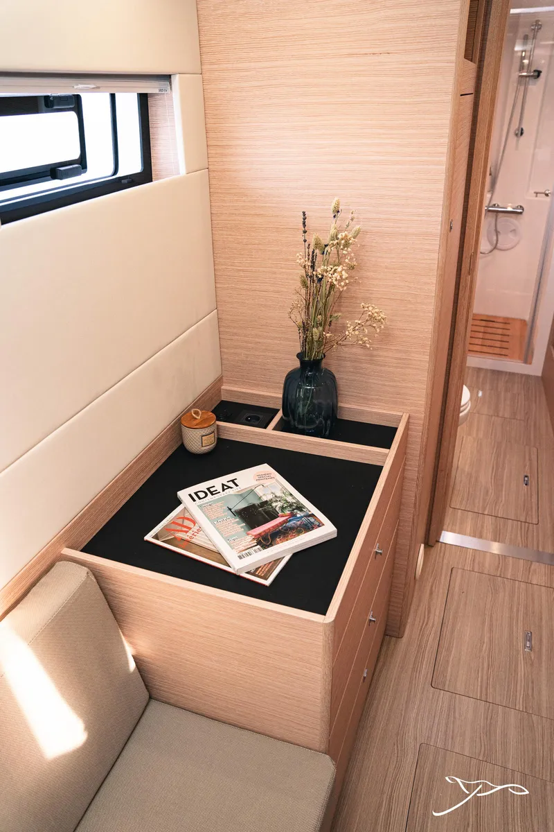 Slide: The Image of Interior of 2025 Nautitech 40 Open yacht, featuring modern decor and a cozy seating area. - 48