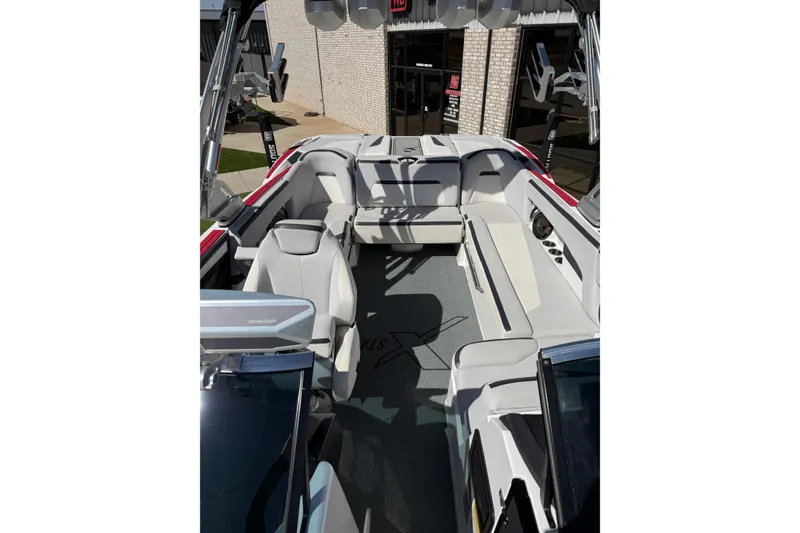 Slide: The Image of 2021 MasterCraft XStar boat interior with spacious seating and modern design. - 20