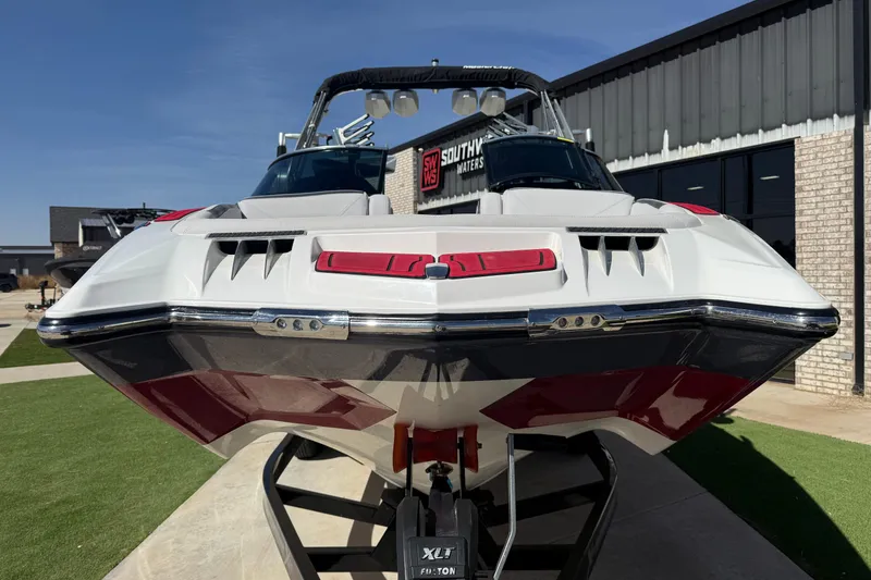 Slide: The Image of 2021 MasterCraft XStar boat on display, showcasing sleek design and modern features. - 9