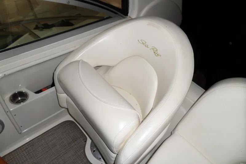 Slide: The Image of White leather seat on 2001 Sea Ray 340 Sundancer boat interior. - 28