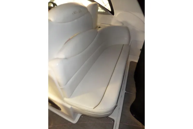 Slide: The Image of 2001 Sea Ray 340 Sundancer interior seating, white leather upholstery. - 32