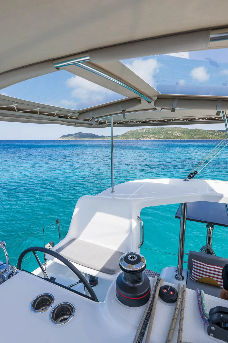 Slide: The Image of Modern Lagoon 38 catamaran cockpit with ocean view, 2025 model. - 14