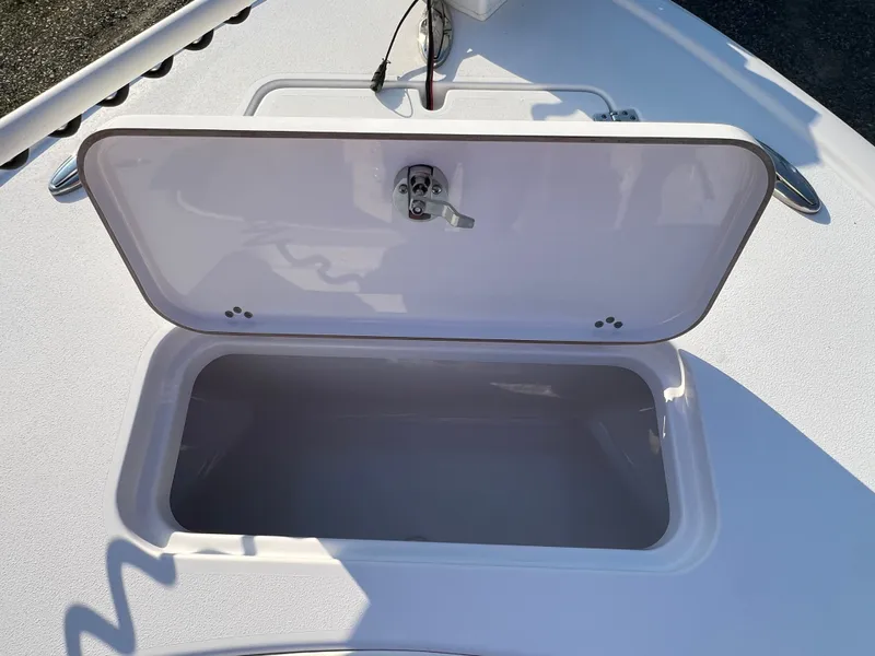 Slide: The Image of 2020 Sportsman Masters 267OE Bay Boat seating area with storage compartment. - 46