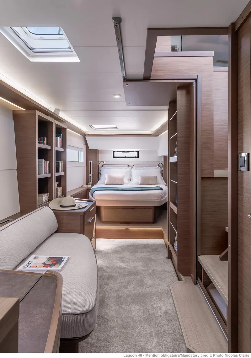 Slide: The Image of Luxurious interior of 2025 Lagoon 46 ICONIC yacht, featuring modern design and cozy furnishings. - 12
