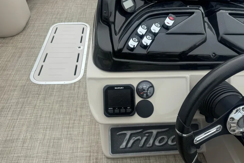 Slide: The Image of Control panel of 2017 JC 23 Neptoon TT Sport boat with steering wheel and gauges. - 7