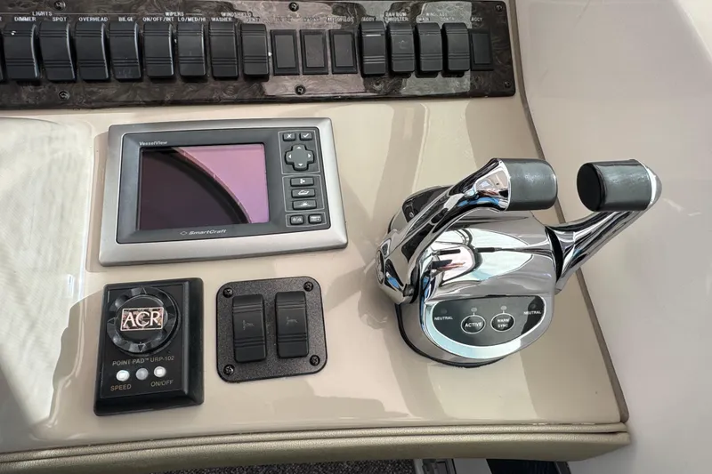 Slide: The Image of Control panel of 2008 Sea Ray 40 Sundancer with controls. - 22