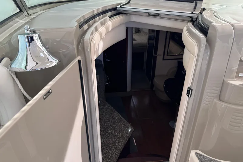 Slide: The Image of 2008 Sea Ray 40 Sundancer cabin entrance with sleek interior design. - 31