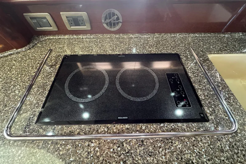 Slide: The Image of Granite countertop with electric cooktop on 2008 Sea Ray 40 Sundancer yacht. - 40