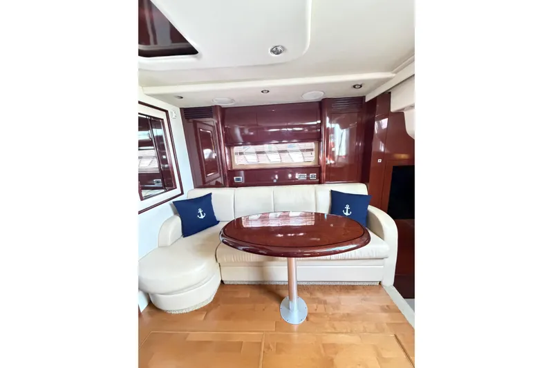 Slide: The Image of Luxurious interior of 2008 Sea Ray 40 Sundancer yacht with elegant seating and table. - 43