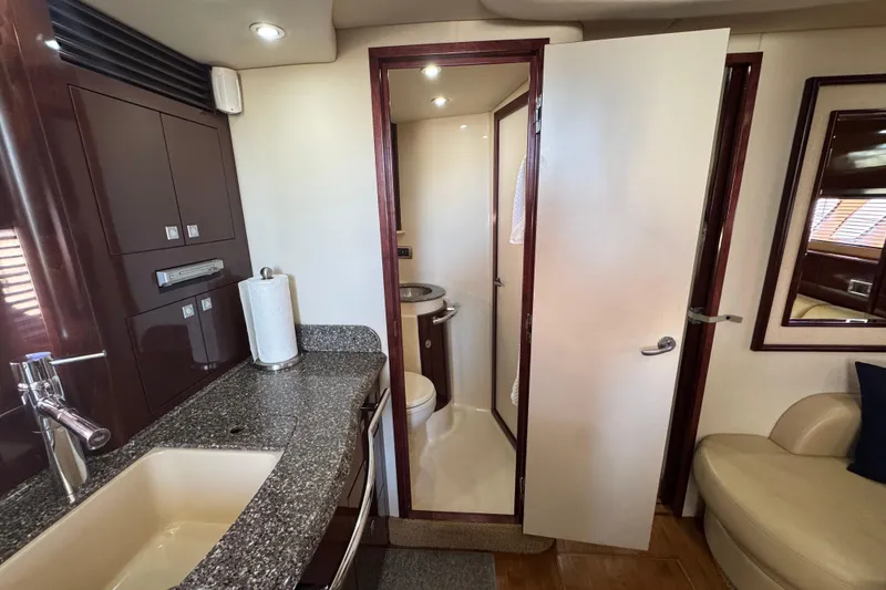Slide: The Image of 2008 Sea Ray 40 Sundancer yacht interior with bathroom and kitchenette. - 46