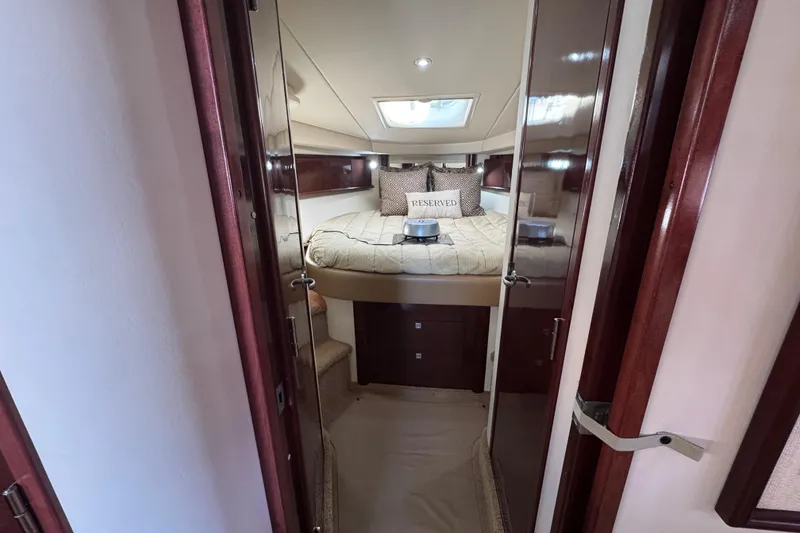 Slide: The Image of Luxurious cabin interior of 2008 Sea Ray 40 Sundancer yacht with cozy bed. - 50