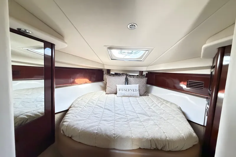 Slide: The Image of Luxurious cabin interior of 2008 Sea Ray 40 Sundancer yacht with cozy bed. - 51