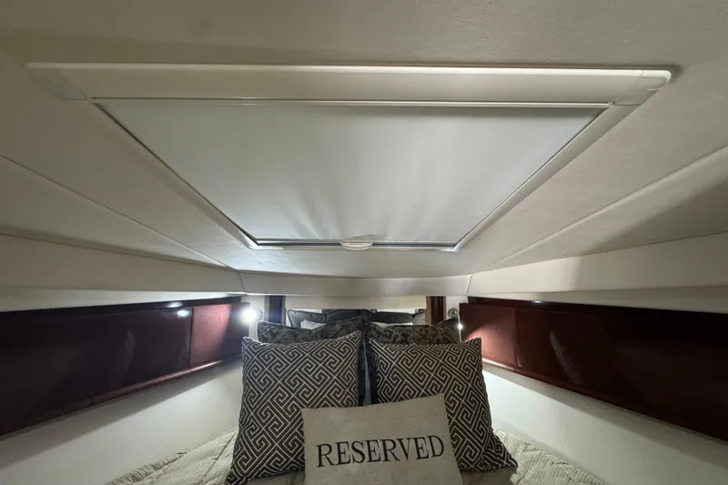 Slide: The Image of Luxurious cabin interior of 2008 Sea Ray 40 Sundancer yacht with reserved sign. - 52