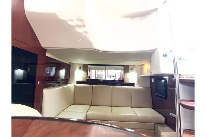 Slide: The Image of Interior of 2008 Sea Ray 40 Sundancer yacht with beige leather seating and modern design. - 61