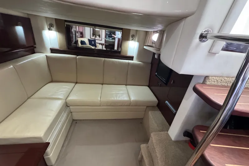 Slide: The Image of Luxurious interior of 2008 Sea Ray 40 Sundancer yacht with beige leather seating. - 62