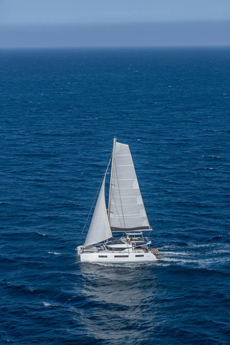 Slide: The Image of Sailing Lagoon 51 ICONIC catamaran on open sea, 2025 model. - 22