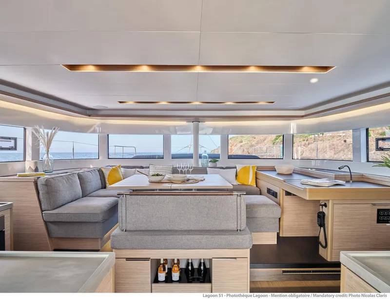 Slide: The Image of Luxurious interior of 2025 Lagoon 51 ICONIC yacht with modern design and panoramic windows. - 30