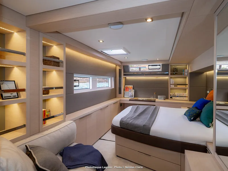 Slide: The Image of Luxurious interior of 2025 Lagoon 55 yacht with modern design and cozy bedroom. - 18