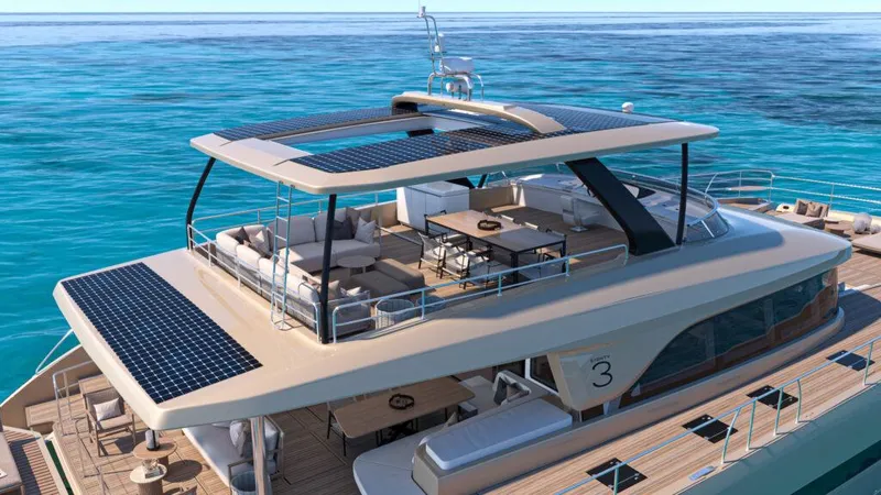 Slide: The Image of Luxurious 2025 Lagoon 83 yacht with solar panels, cruising on clear blue ocean waters. - 23