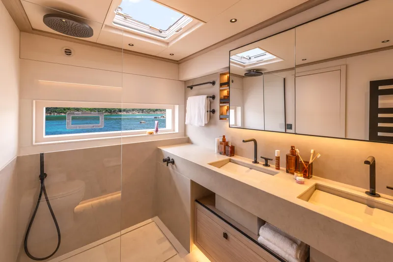 Slide: The Image of Luxurious bathroom in 2025 Lagoon Eighty 2 yacht with ocean view and modern fixtures. - 33