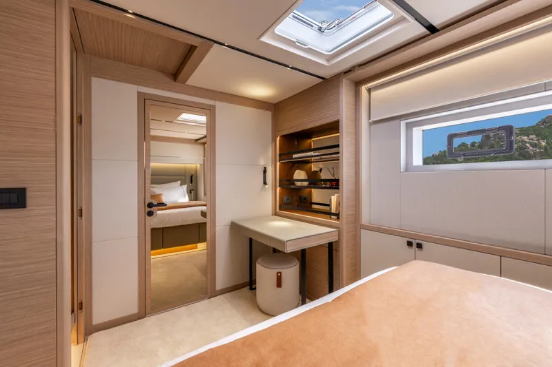 Slide: The Image of Luxurious interior of 2025 Lagoon Eighty 2 yacht with modern design and natural lighting. - 35