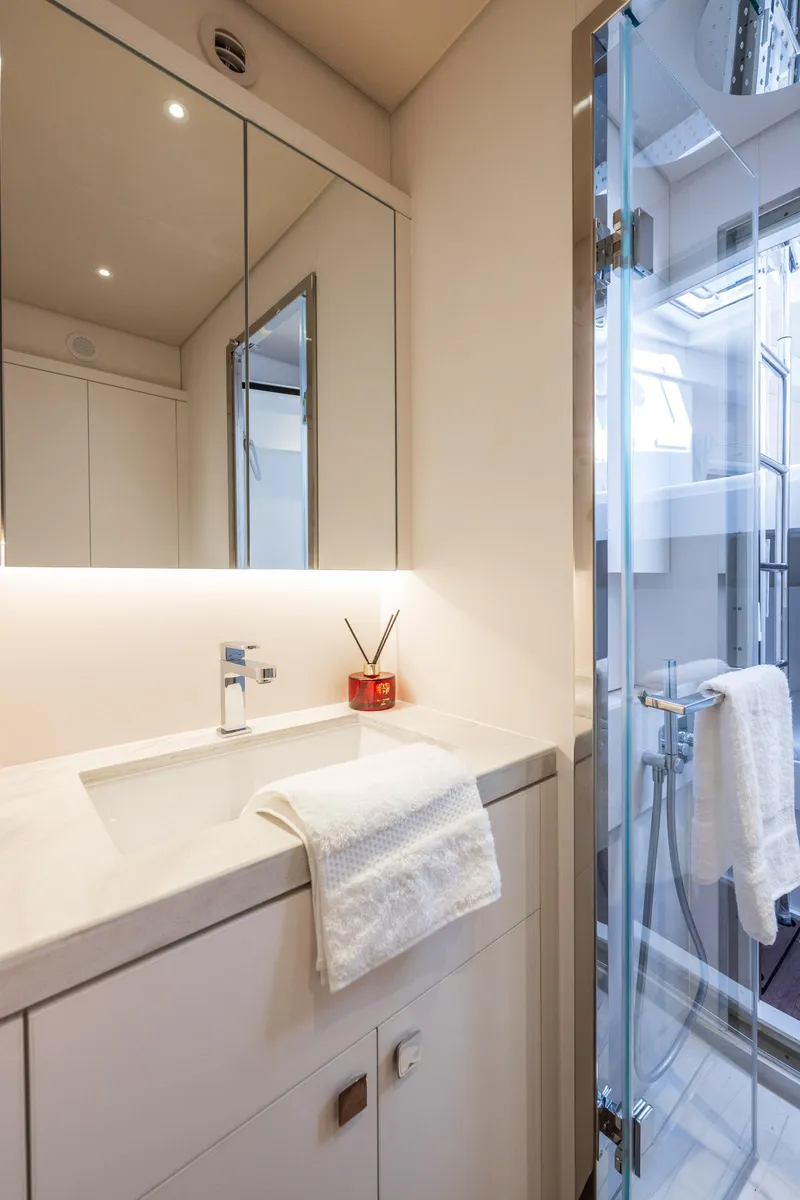 Slide: The Image of Modern bathroom in 2025 Lagoon Eighty 2 yacht with sleek design and glass shower. - 43