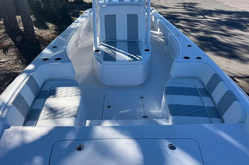 Slide: The Image of 2026 Contender 29 Bay boat interior with compact marine toilet. - 17