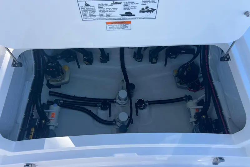 Slide: The Image of 2026 Contender 29 Bay boat on trailer, city skyline in background. - 25