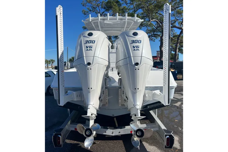 Slide: The Image of 2026 Contender 29 Bay boat interior with dual seats and storage compartments. - 8