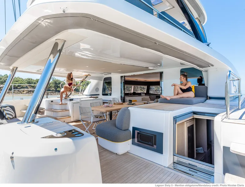 Slide: The Image of Luxurious 2025 Lagoon SIXTY 5 yacht with spacious deck and modern amenities. - 3