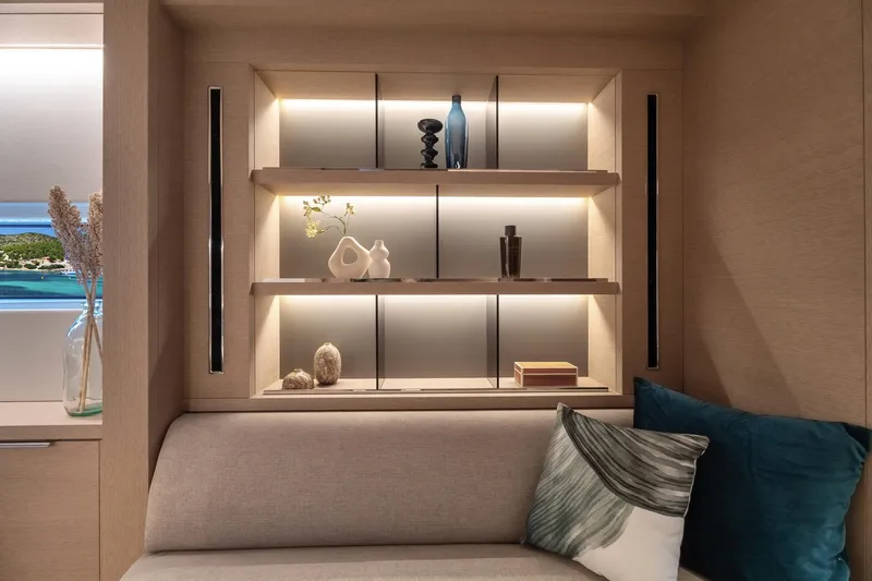 Slide: The Image of Luxurious interior of 2025 Lagoon SIXTY 5 yacht with elegant shelving and decor. - 32