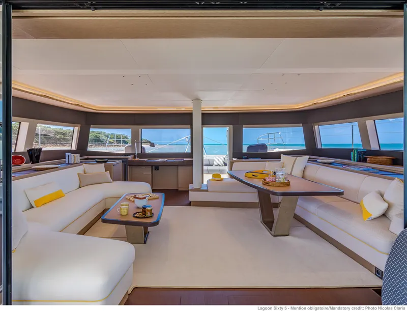 Slide: The Image of Luxurious interior of 2025 Lagoon SIXTY 5 yacht with elegant seating and ocean view. - 9