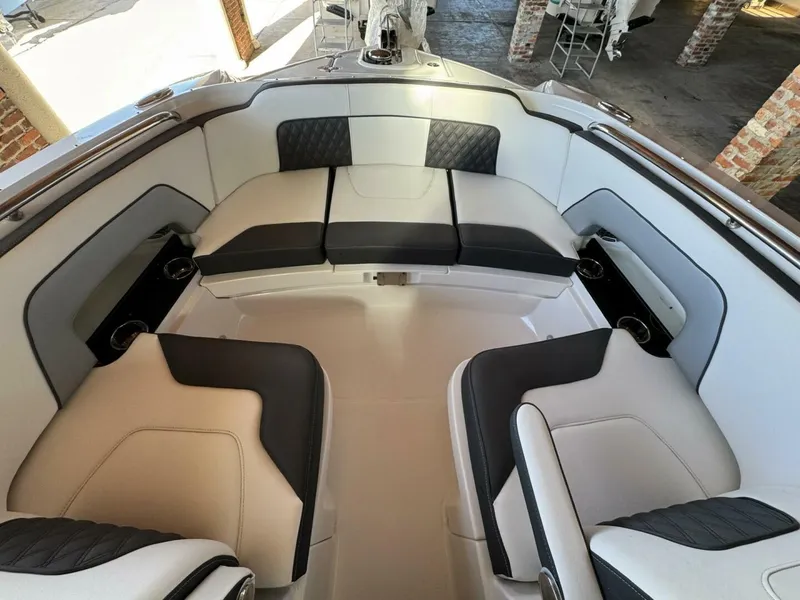 Slide: The Image of 2024 Monterey M-65 boat interior with luxurious seating and modern design. - 16